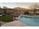 Inviting pool with mountain views, landscaping, and patio at 41717 N Moss Springs Ct, Anthem, AZ 85086
