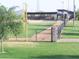 Community baseball field with dugouts and bleachers at 41717 N Moss Springs Ct, Anthem, AZ 85086