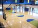 Indoor basketball court with polished wood floors at 41717 N Moss Springs Ct, Anthem, AZ 85086