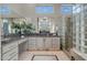 Elegant bathroom with granite vanity, glass shower, and soaking tub at 41717 N Moss Springs Ct, Anthem, AZ 85086