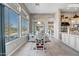 Breakfast nook with a table and chairs near the kitchen, overlooking the pool at 41717 N Moss Springs Ct, Anthem, AZ 85086