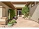 Elegant entry with stone pathway and lush landscaping at 41717 N Moss Springs Ct, Anthem, AZ 85086