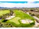 Expansive green golf course with scenic mountain views at 41717 N Moss Springs Ct, Anthem, AZ 85086