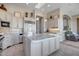 Gourmet kitchen boasts granite countertops, stainless steel appliances, and ample cabinet space at 41717 N Moss Springs Ct, Anthem, AZ 85086
