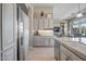 Well-equipped kitchen with stainless steel appliances and custom cabinetry at 41717 N Moss Springs Ct, Anthem, AZ 85086