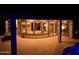 Night view of the house from the backyard at 41717 N Moss Springs Ct, Anthem, AZ 85086
