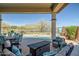 Relaxing patio overlooking the pool and scenic views at 41717 N Moss Springs Ct, Anthem, AZ 85086