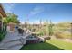 Outdoor patio with seating and built in BBQ area at 41717 N Moss Springs Ct, Anthem, AZ 85086