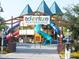 Community playground with slides, climbing structures, and train theme at 41717 N Moss Springs Ct, Anthem, AZ 85086