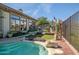 Freeform pool with waterfall and a spacious patio at 41717 N Moss Springs Ct, Anthem, AZ 85086