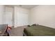 Bedroom with hardwood furniture, carpet, and natural light from the window at 41917 W Manderas Ln, Maricopa, AZ 85138