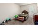 Bedroom with hardwood furniture, carpet, and natural light from the window at 41917 W Manderas Ln, Maricopa, AZ 85138