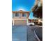 Charming two-story home featuring neutral colors, a two car garage and a well maintained front yard at 4615 W Boston St, Chandler, AZ 85226