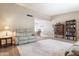 Living room with vinyl floors, plush seating, and large carpeted area at 4615 W Boston St, Chandler, AZ 85226