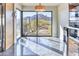 Bright and spacious living area with large windows and mountain views at 5826 E Indian Bend Rd, Paradise Valley, AZ 85253