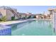 Stunning pool area with luxurious lounge seating, an outdoor dining set and desert landscaping at 5826 E Indian Bend Rd, Paradise Valley, AZ 85253