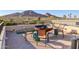 Rooftop deck with mountain views, fire pit, and ample seating for entertaining at 5826 E Indian Bend Rd, Paradise Valley, AZ 85253