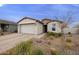 Single-story home with a two-car garage and landscaped front yard at 5929 S Del Rancho --, Mesa, AZ 85212