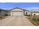 Two-car garage and stone accents at 5929 S Del Rancho --, Mesa, AZ 85212