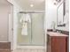 Elegant bathroom with a large shower and granite vanity at 6535 E Superstition Springs Blvd # 124, Mesa, AZ 85206