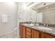 Double vanity bathroom with granite countertop at 6535 E Superstition Springs Blvd # 124, Mesa, AZ 85206