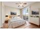 Main bedroom with wood floors and access to balcony at 6535 E Superstition Springs Blvd # 124, Mesa, AZ 85206