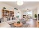 Open living space with fireplace and access to patio at 6535 E Superstition Springs Blvd # 124, Mesa, AZ 85206