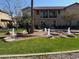 Community water feature with fountain and landscaping at 6535 E Superstition Springs Blvd # 124, Mesa, AZ 85206