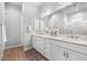 Elegant bathroom with double vanity and large mirror at 6607 E Libby St, Phoenix, AZ 85054
