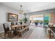 Elegant dining room with farmhouse table and access to the patio at 6607 E Libby St, Phoenix, AZ 85054