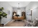 Bright home office with built-in shelving and comfortable seating at 6607 E Libby St, Phoenix, AZ 85054