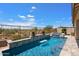 Relaxing pool and spa with a stunning desert landscape view at 6607 E Libby St, Phoenix, AZ 85054