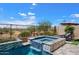 Private spa and pool area with tranquil desert views at 6607 E Libby St, Phoenix, AZ 85054