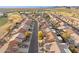 Wide aerial shot of the neighborhood's street, homes, and desert landscaping at 7307 E Texas Ebony Dr, Gold Canyon, AZ 85118