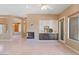 Spacious living room with a fireplace and built-in entertainment center at 7449 E Soaring Eagle Way, Scottsdale, AZ 85266