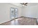 Bright open room featuring double doors to the outdoor patio with view of the pool at 811 W Northern Ave, Phoenix, AZ 85021