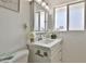 Bathroom featuring white vanity sink and mirror at 811 W Northern Ave, Phoenix, AZ 85021