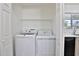 Laundry room with newer washing machine and clothes dryer at 811 W Northern Ave, Phoenix, AZ 85021