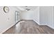 Open living room with tile floors, a ceiling fan and double doors to backyard at 811 W Northern Ave, Phoenix, AZ 85021
