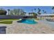 Backyard with large pool, patio area, and grass at 811 W Northern Ave, Phoenix, AZ 85021
