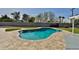 Backyard with a fenced-in pool, grassy area, and patio at 811 W Northern Ave, Phoenix, AZ 85021