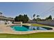 A large swimming pool in the backyard, perfect for summer fun and relaxation in a private outdoor space at 811 W Northern Ave, Phoenix, AZ 85021
