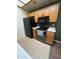 Clean kitchen with oak cabinets and black appliances at 8140 N 107Th Ave # 99, Peoria, AZ 85345