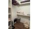 Laundry room with washer, dryer, and ample storage shelves at 8140 N 107Th Ave # 99, Peoria, AZ 85345