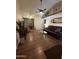Bright living room with hardwood floors and a ceiling fan at 8140 N 107Th Ave # 99, Peoria, AZ 85345