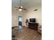 Spacious living room with hardwood floors and a fireplace at 8140 N 107Th Ave # 99, Peoria, AZ 85345