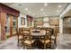Cozy dining area with large round table is perfect for Gathering meals and entertaining guests at 8260 E Sunset View Dr, Gold Canyon, AZ 85118