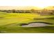 Close-up of a well-maintained golf course featuring a sand trap and lush green at 8260 E Sunset View Dr, Gold Canyon, AZ 85118