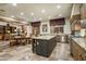 Gourmet kitchen with granite counters, stainless appliances, a large island and an eat-in kitchen at 8260 E Sunset View Dr, Gold Canyon, AZ 85118
