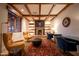 Inviting office space with wood beams, fireplace and bookshelves at 8260 E Sunset View Dr, Gold Canyon, AZ 85118